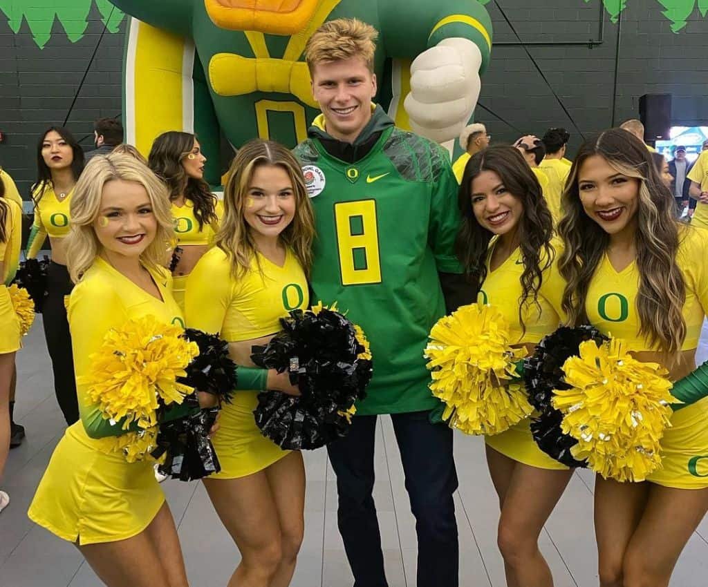 Jenson Brooksby with cheerleaders.