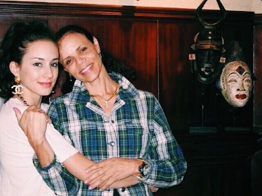 Troian Bellisario parents